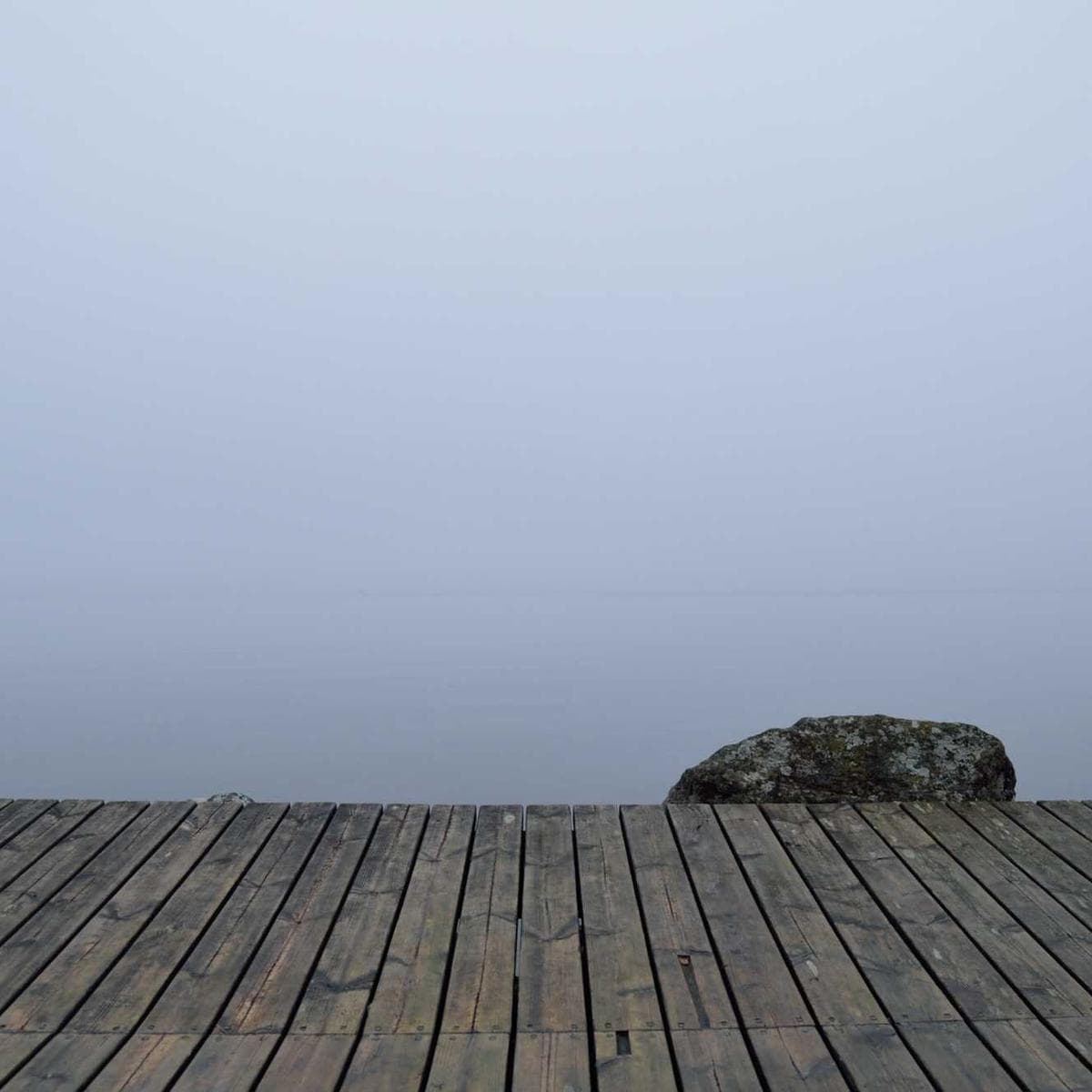 Close-up detail of layered terracotta and marble tiles